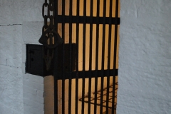 Jail door with shackles